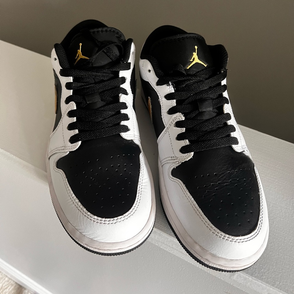 Jordan Air 1 Low in Black and Metallic Gold